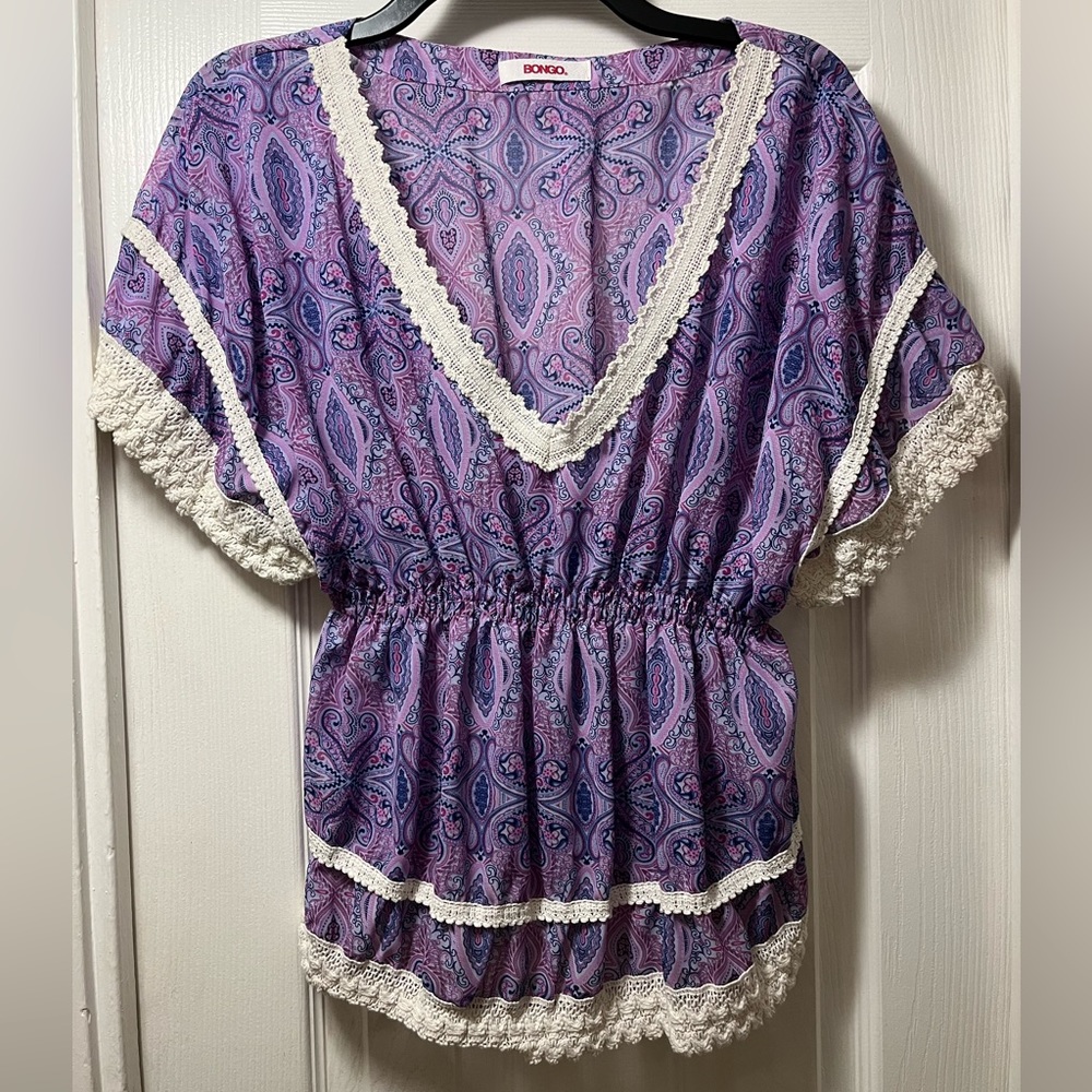 Purple batwing sleeve blouse with paisley design and crochet detail